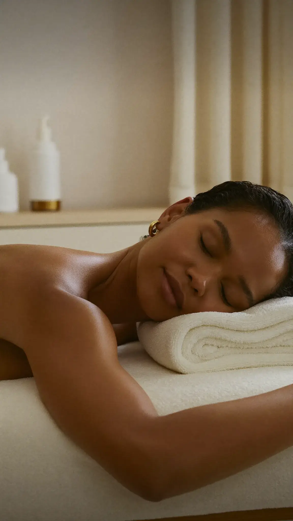 Woman resting on a massage table