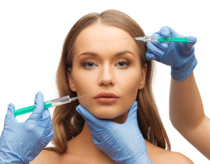 picture-woman-face-beautician-hands-with-syringes_380164-28038